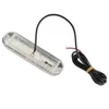 A single underwater boat light with a black wire attached, isolated on a white background. Voir les images du produit