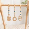 Holz-Spielbogen für Babys – 62 × 57 cm – mit 3 liebevoll Produktbild-Vorschau 4