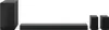 A black soundbar system with a subwoofer and two wireless speakers, displayed against a white background. Voir les images du produit