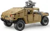 A tan-colored toy Humvee with a mounted gun, shown from a three-quarter rear view against a white background. Produktbild-Vorschau