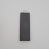 A black Amazon Fire TV Stick with the Amazon logo on a light gray background. Náhled obrázku produktu