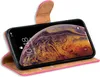 A pink flip case for an iPhone XS Max is shown open, displaying the phone's screen with a colorful abstract wallpaper. Produktbild-Vorschau