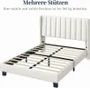 A white upholstered bed frame with a slatted base, shown from a slightly elevated side angle. Produktbild-Vorschau