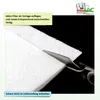 A close-up of white filter material being cut with scissors, with instructional text and a brand logo. Produktbild-Vorschau