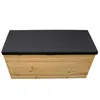 A wooden storage box with a black cushion on top, presented against a white background. Anteprima dell’immagine prodotto
