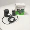 A Belkin BoostCharge Pro 2-in-1 Wireless Charging Dock with MagSafe 15W, along with its power adapter and cable, is displayed next to its packaging. Voir les images du produit