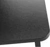 A close-up view of the textured surface of a black monitor stand. Náhled obrázku produktu