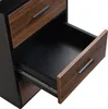 A close-up view of an open drawer on a desk with a wood-grain finish. Anteprima dell’immagine prodotto