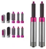 Silber- und rosafarbenes Multi-Styling-Haargerät mit zwei Haupteinheiten und mehreren Bürsten- und Lockenaufsätzen Podgląd zdjęcia produktu