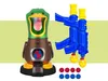 A toy duck shooting game with two blasters and foam balls, set against a light green and white background. Voir les images du produit