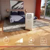 A portable air conditioner is shown in a bedroom setting, with icons indicating features at the bottom. Produktbild-Vorschau
