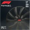 The image shows the packaging of Formula 1 wheel covers. Produktbild-Vorschau