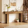 A wooden console table with decorative items and a basket of flowers in a hallway next to a staircase. Podgląd zdjęcia produktu