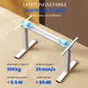 A white electric standing desk frame with blue illuminated motors is shown on a beige carpeted floor. Text overlays describe its features. Produktbild-Vorschau