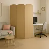 A room divider is shown in a living room setting, next to a sofa and a desk with a computer. Náhled obrázku produktu