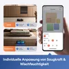 A collage showing a robot vacuum cleaner in a kitchen and bedroom, with a smartphone app interface displayed. Produktbild-Vorschau