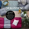 Outdoor seating area with modular sofa, beanbag, and decorative elements. Voir les images du produit