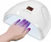 A hand with painted nails is placed inside a white UV lamp for curing nail polish. Produktbild-Vorschau