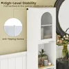 Close-up of a white cabinet with a frosted glass door, highlighting its stability features. Produktbild-Vorschau