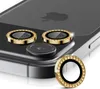 A close-up view of decorative camera lens protectors on the back of a smartphone. Produktbild-Vorschau