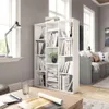 A white bookshelf filled with books is placed in a room with a sofa and a coffee table. Anteprima dell’immagine prodotto