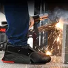 A person is welding, with sparks flying around their feet and a safety shoe visible. Produktbild-Vorschau