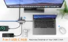 A USB C hub connected to a laptop and monitor, with phones and a mouse also connected. Produktbild-Vorschau