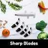 A collection of kitchen appliance parts and fresh vegetables arranged on a marble-patterned surface. Anteprima dell’immagine prodotto