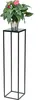 A potted plant with pink flowers sits on a black metal plant stand. Anteprima dell’immagine prodotto