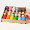 Giocattolo montessoriano in legno "Bambolina con tappo in Anteprima dell’immagine prodotto 7