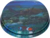 A toilet seat with an underwater scene featuring a sea turtle and clownfish. Náhled obrázku produktu