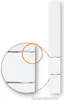 A close-up view of a white toilet flush plate, highlighting a specific detail with an orange circle. Produktbild-Vorschau