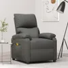 A dark gray fabric massage chair is shown in a room with a floor lamp and a small table with a plant. Produktbild-Vorschau