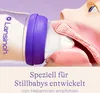 A close-up illustration of a baby's mouth and a Lansinoh baby bottle nipple. Voir les images du produit