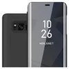 A close-up view of a black smartphone case with a mirrored front cover displaying the time and date. Náhľad obrázku produktu