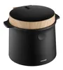 A product image of a black and wood-grain colored appliance. Voir les images du produit