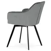 A grey velvet dining chair with black metal legs, shown from the back-right. Náhled obrázku produktu