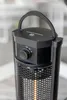Close-up of the top part of a black heater. Produktbild-Vorschau