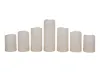 A set of seven LED candles of varying heights arranged in a row. Produktbild-Vorschau