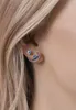 A close-up of a person's ear wearing Disney Lilo & Stitch earrings. Anteprima dell’immagine prodotto