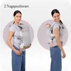 Two images of a woman wearing a baby carrier with a baby in it, demonstrating different carrying positions. Anteprima dell’immagine prodotto
