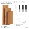 The image shows wooden shelves, mounting hardware, and instructions for assembly. Produktbild-Vorschau