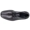 A top-down view of a black men's dress shoe. Podgląd zdjęcia produktu