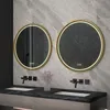 A modern bathroom with two round LED mirrors above a double vanity with black marble countertops and black faucets. Voir les images du produit