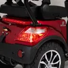 Close-up rear view of a red three-wheeled scooter. Produktbild-Vorschau