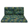 A set of two cushions with a tropical leaf pattern, designed for outdoor use. Náhled obrázku produktu