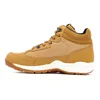 A side view of a single brown hiking boot against a white background. Produktbild-Vorschau