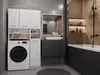 A modern bathroom with a washing machine, cabinets, sink, and bathtub. Voir les images du produit
