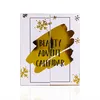 A white beauty advent calendar with gold foil accents and snowflakes. Produktbild-Vorschau