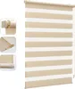 A close-up view of a striped roller blind. Voir les images du produit
